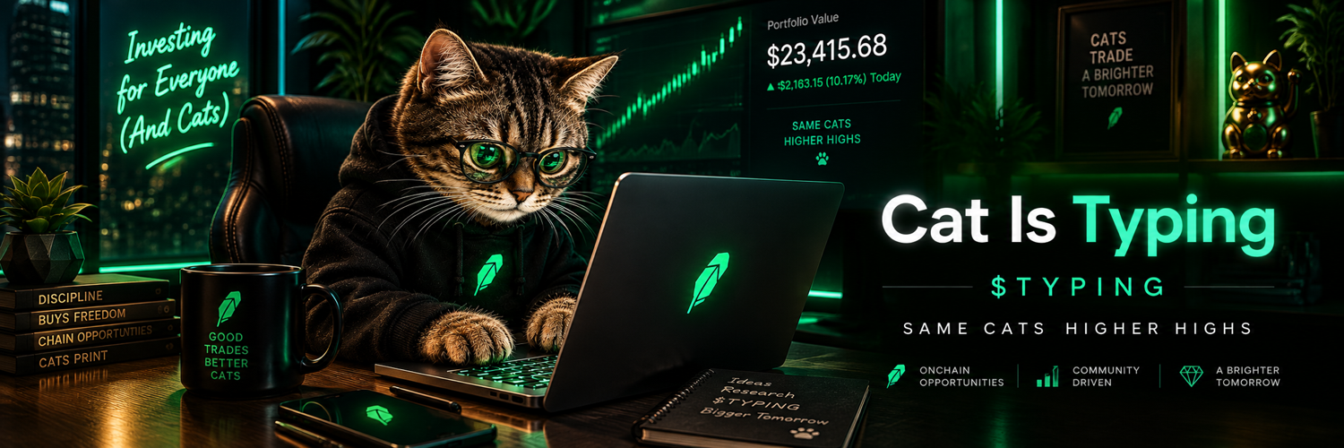 A trader cat wearing glasses and typing at a laptop